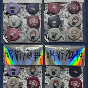 May include: Sets of Jujutsu Kaisen character button pins. Each set contains eight round pins with colorful character illustrations. The packaging includes Japanese text and a holographic header. The pins are arranged in rows on a blue background.