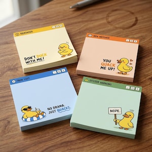 May include: Four square sticky note pads featuring computer window designs. The yellow pad says REMINDER and DON'T DUCK WITH ME. The orange pad says NEW MESSAGE and YOU QUACK ME UP. The blue pad says TASK LIST and NO DRAMA. JUST QUACKS. The green pad says SYSTEM WARNING and NOPE.