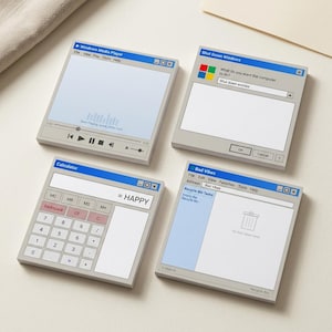 May include: Four square sticky note pads featuring retro computer interface designs. The designs include a Windows Media Player, a Shut Down Windows dialog box, a Calculator with the text = HAPPY, and a Bad Vibes folder window.