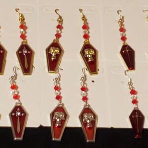 Red coffin charm earrings