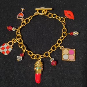 Red ladies essentials charm bracelet