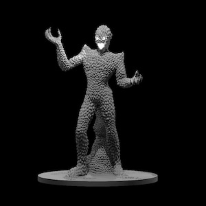 May include: A gray, detailed, 3D printed miniature of a creature with a scaly, textured body and a menacing expression. The creature is standing on a round base.