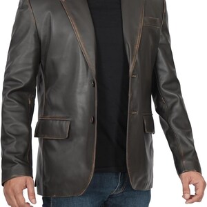 May include: A brown leather blazer with a distressed look. The blazer has a two-button closure and two front pockets.
