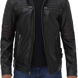 May include: Black leather jacket with a stand-up collar, multiple zippered pockets, and red accent stripes on the shoulders and sleeves. The jacket has a front zipper closure and a quilted design on the shoulders.
