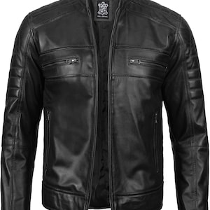 May include: Black leather motorcycle jacket with a zipper closure and multiple pockets.