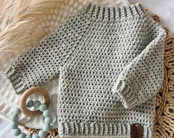 Crocheted baby sweater 0-3 months