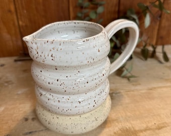 Bubble jug with white glaze