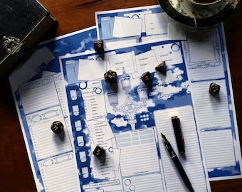 May include: A blue and white tabletop game board with dice and a set of instructions. The board features a cloud-like design with a central tower and a variety of spaces.