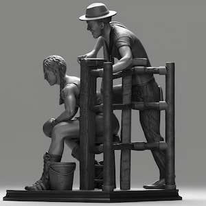 May include: A monochrome sculpture depicting a boxer and their coach. The boxer is seated, wearing gloves and boots, with a bucket nearby. The coach, in a hat, leans over a wooden structure, watching. The sculpture is detailed.
