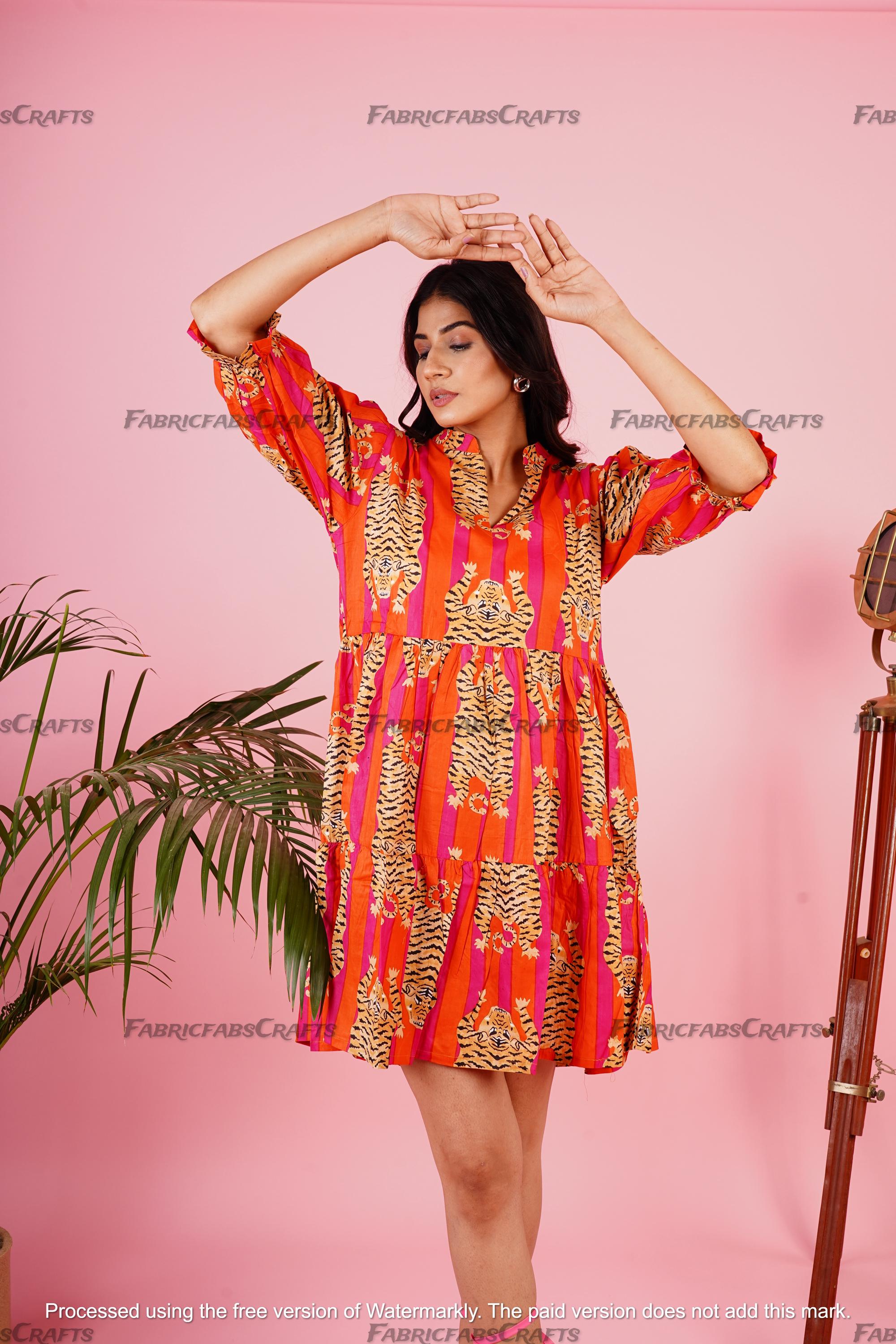 orange tiger dress ASOS DESIGN sleeveless midi dress with ruching detail and cut-out in orange tiger print