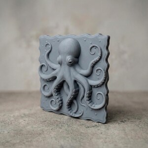 High-detail 3D STL model of an octopus in bas relief, featuring curled tentacles and a textured underwater design. Ideal for 3D printing, CNC wood carving, or laser engraving. Perfect for marine-themed wall art, nautical gifts, or ocean-inspired decor. This digital file is suitable for use with wood, acrylic, resin, and other engravable materials. Download and craft ocean life into your next project.