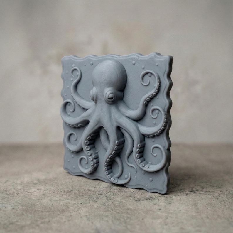 High-detail 3D STL model of an octopus in bas relief, featuring curled tentacles and a textured underwater design. Ideal for 3D printing, CNC wood carving, or laser engraving. Perfect for marine-themed wall art, nautical gifts, or ocean-inspired decor. This digital file is suitable for use with wood, acrylic, resin, and other engravable materials. Download and craft ocean life into your next project.