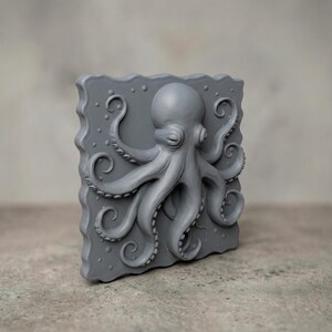 High-detail 3D STL model of an octopus in bas relief, featuring curled tentacles and a textured underwater design. Ideal for 3D printing, CNC wood carving, or laser engraving. Perfect for marine-themed wall art, nautical gifts, or ocean-inspired decor. This digital file is suitable for use with wood, acrylic, resin, and other engravable materials. Download and craft ocean life into your next project.