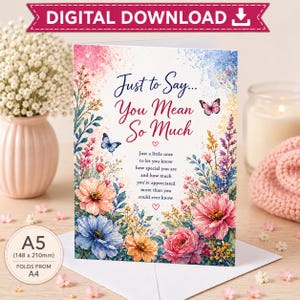 May include: A greeting card featuring a watercolour floral design with butterflies and the text: Just to Say... You Mean So Much. Below is a message about appreciation. The card is A5 size, 148 x 210 mm, and folds from A4. The design includes pink, blue, and yellow flowers.