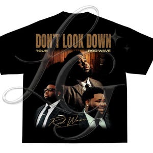 May include: A black short-sleeve t-shirt featuring a graphic print of Rod Wave in three different poses. The text DON'T LOOK DOWN, TOUR, and ROD WAVE appear in gold lettering. The design includes small star icons and a cursive signature graphic.