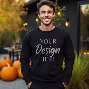 Könnte beinhalten: Ein schwarzer Pullover mit dem Aufdruck "YOUR Design HERE" auf der Vorderseite.