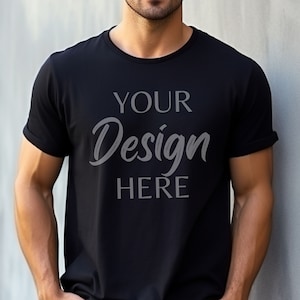May include: A black t-shirt with the text "YOUR Design HERE" printed on the front.