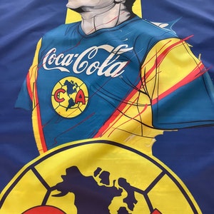 May include: A blue and yellow soccer jersey with the text "Coca-Cola" and a logo of a world map with the letters "CA" inside. The jersey is worn by a cartoon illustration of a soccer player.