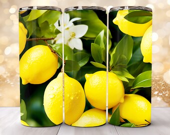 Può includere: Tre bicchieri in acciaio inossidabile con un design a forma di albero di limone. I bicchieri mostrano un primo piano di limoni gialli con foglie verdi e fiori bianchi.
