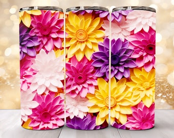 Può includere: Tre bicchieri in acciaio inossidabile con un motivo floreale colorato. I bicchieri presentano una varietà di fiori rosa, gialli, viola e bianchi.