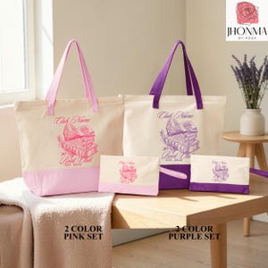 A set of two tote bags and a small pouch, each with a unique design, placed on a wooden table. The bags are pink and purple, and the pouch is purple. The image also includes text that reads "Club Name" and "Book Club" along with the year "2012".