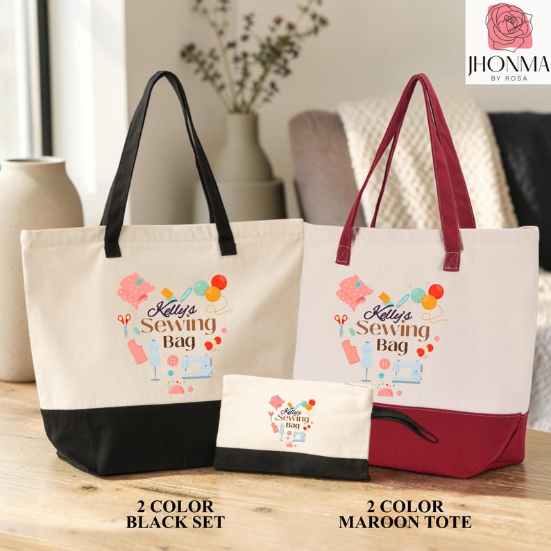 two tote bags, one black and one maroon, with the black bag being a larger size and the maroon bag being a smaller size. The bags are placed on a wooden surface, and there is a vase and a potted plant in the background.