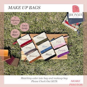 May include: Eight different color makeup bags with zipper closures. The bags are lined and have a white canvas exterior with a colored bottom. The colors are maroon, grey, green, blue, pink, purple, black, and brown.