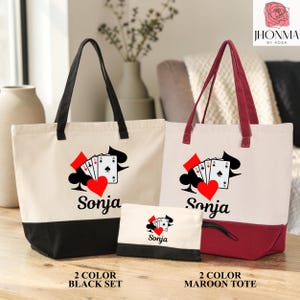 May include: Two canvas tote bags and a matching zippered pouch, each featuring a graphic of playing cards and a red heart above the name Sonja. One tote has a black base and handles, while the other has a maroon base and handles.