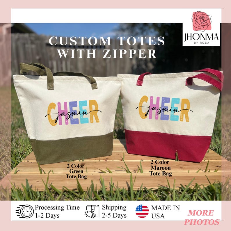 May include: Two canvas tote bags with zipper closures. The tote bags are personalized with the text "CHEER Jasmin" in colorful letters. One tote bag is green and the other is maroon.