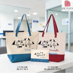 May include: Two canvas tote bags and a matching zippered pouch in cream with blue or maroon accents. Each item features a black graphic of a heartbeat line with animal silhouettes and paw prints, personalized with the name Samantha in script.