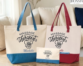 May include: Two canvas tote bags and one small pouch featuring the black text Massage Therapist with a hand icon. One tote and the pouch have blue accents and the name Michelle, while the other tote has maroon accents and a name in maroon.