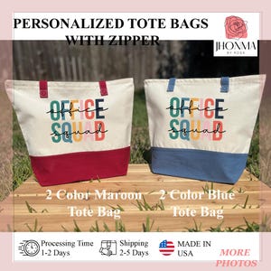 May include: Two personalized tote bags with the text "Office Squad" in colorful letters. The tote bags are made of canvas and have a maroon and blue bottom. The bags are on a wooden surface.