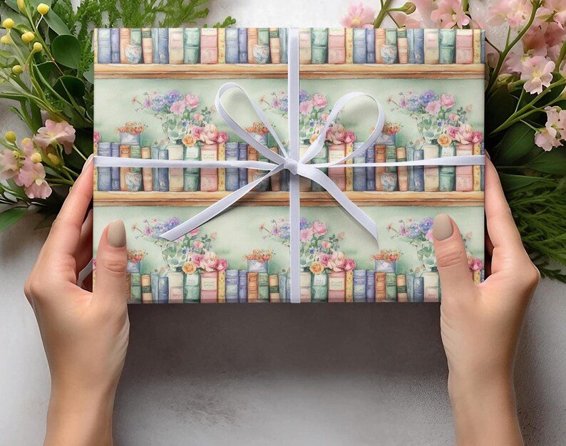 gift wrap with pastel colored books on a shelf and flowers on a pastel green background