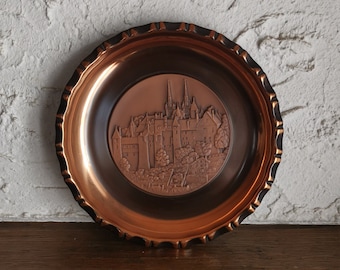 Vintage Neuchatel 7" (18 cm) copper souvenir plate for wall or table decor from Switzerland with embossed pattern