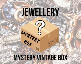 Vintage surprise box full of jewelry, bijouterie: beads, necklaces, rings, earrings, brooches and more