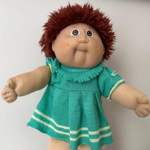Rara boneca Cabbage Patch Kid Jesmar de 1984, fabricada na Espanha, modelo Brat Face nº 2, com vestido original.