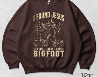 I Found Jesus Bigfoot Crewneck Sweatshirt Still Looking For Sasquatch Funny Christian Humor Vintage Forest Graphic Cryptid Lover Gift