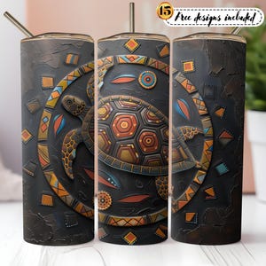 May include: A 20 oz. stainless steel tumbler with a detailed turtle design. The design features a turtle in shades of brown, orange, and yellow, set against a textured black background. The tumbler includes a straw and the text "15 Free designs included".