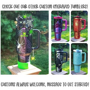May include: A selection of custom engraved Stanley tumblers. One tumbler has a spider web design with a green base and handle. Other tumblers feature space, floral, and abstract designs. The text reads "CHECK OUT OUR OTHER CUSTOM ENGRAVED TUMBLERS!" and "CUSTOMS ALWAYS WELCOME, MESSAGE TO GET STARTED!"