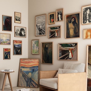 May include: A wall gallery featuring a variety of framed artwork, including abstract paintings, portraits, and landscapes. The artwork is displayed in a modern and eclectic style, with a mix of colors and styles.