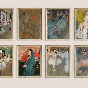 May include: A set of 6 framed art prints featuring paintings of dancers in various poses. The prints are in a light wood frame with a white mat. The paintings are in a variety of styles, including impressionistic and realistic.