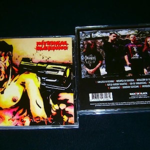 May include: Two CD cases. The front case features a screaming figure with a gun, and the text "Eternal Suffering". The back case shows a band photo. The text "Back on Black" is visible.