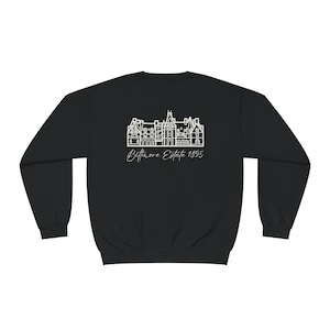 May include: Black sweatshirt with a white outline of a building and the text "Bellmore Estate 1895" on the back.