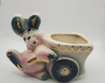 Vintage Pink and Teal Bunny Rabbit Pushing Cart with Black Wheels Planter with Gold Leaf Accents