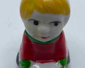 Vintage Ceramic Christmas Ornament Child on Sled - Taiwan