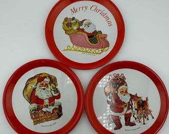 Vintage Metal Christmas Coasters Set of Three (3) Santa in Sleight, Santa Going Down Chimney and Santa Petting Reindeer