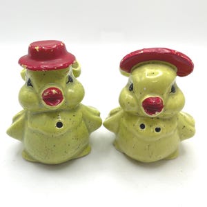 Saleros y pimenteros Chickadee amarillos y rojos