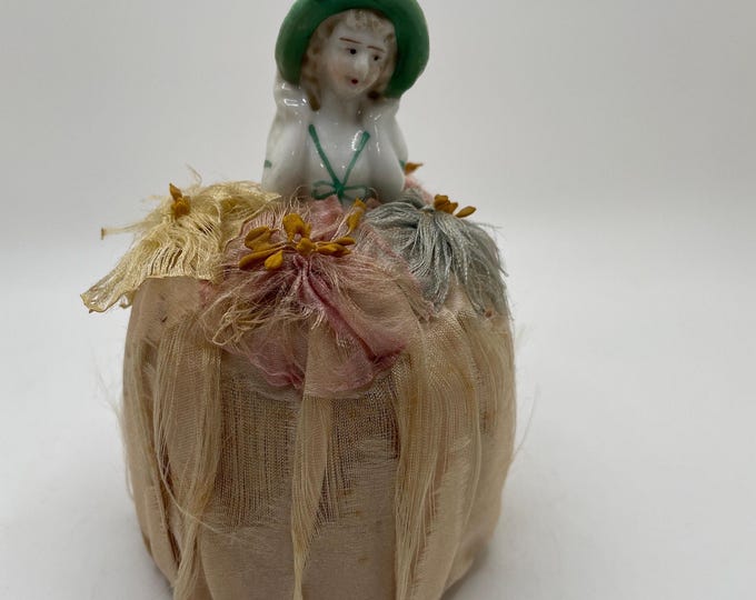 Featured listing image: 1920s Porcelain Half Doll Pincushion Bonnet Light Pink Dress Antique Sewing Collectible Vintage Pin Cushion Doll Floral Top Gift for Sewing