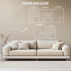 May include: A beige sofa with several pillows is in front of a wall with a "FRAME SIZE GUIDE" graphic. The guide lists various frame size ratios, including 2:3, 4:5, 5:7, 11:14, and 3:4, with corresponding dimensions in inches.