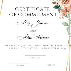 May include: A white certificate of commitment with gold lines and a floral design in the top right corner. The text reads "CERTIFICATE OF COMMITMENT" followed by the names "Mary Jameson" and "Adam Wilkinson". The certificate states that the couple declared a lifetime commitment to each other on the 20th day of July in the year 2023. The certificate has spaces for the officiant and two witnesses.